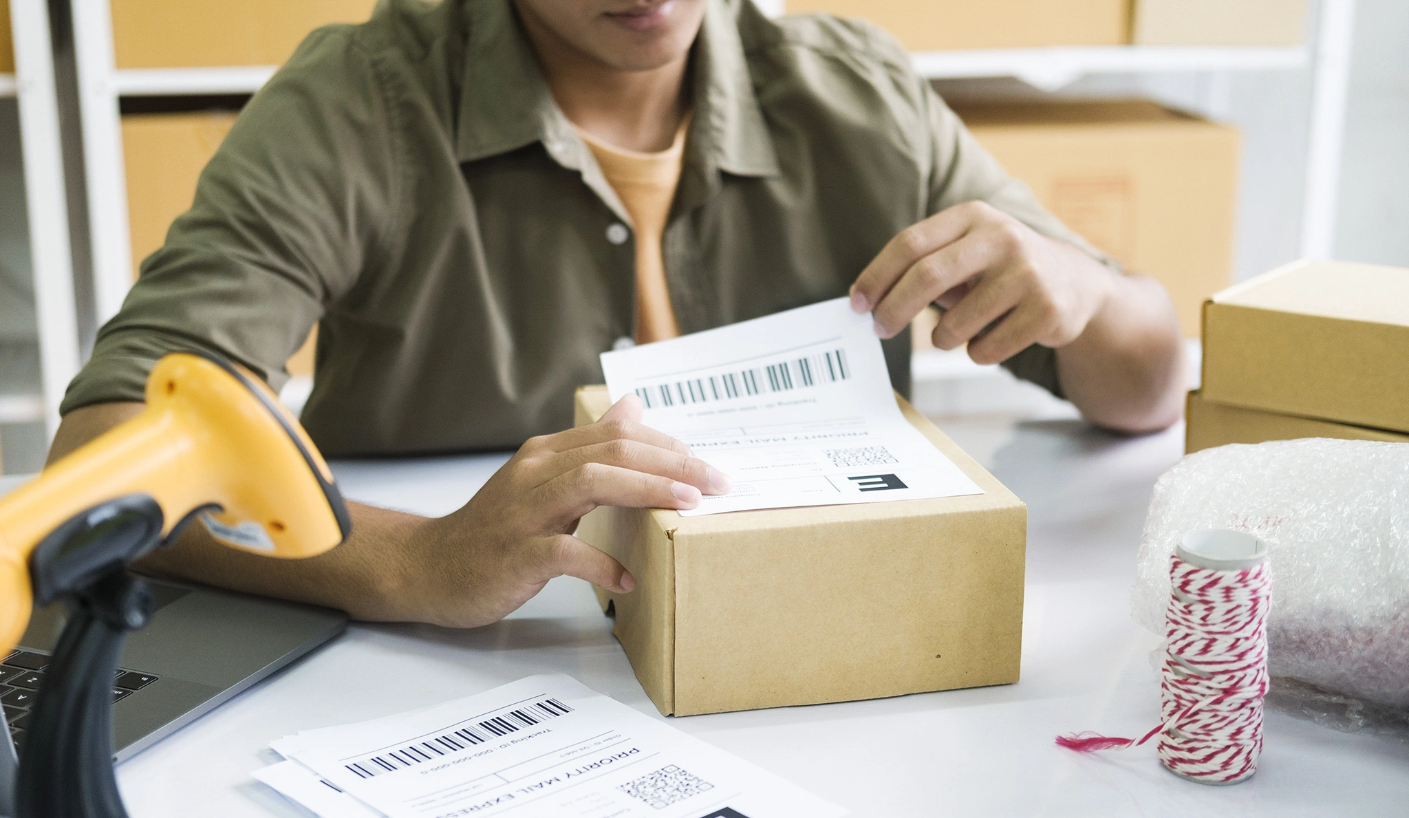 A man looking at the documents required for shipping